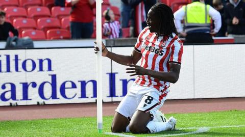 Bosun Lawal celebrates scoring for Stoke City against Birmingham City
