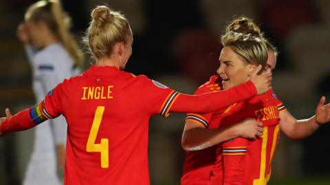 Sophie Ingle celebrating a goal with Jess Fishlock