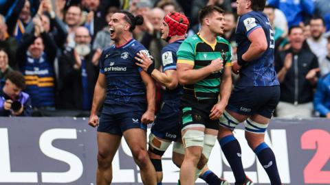 James Lowe celebrates a try