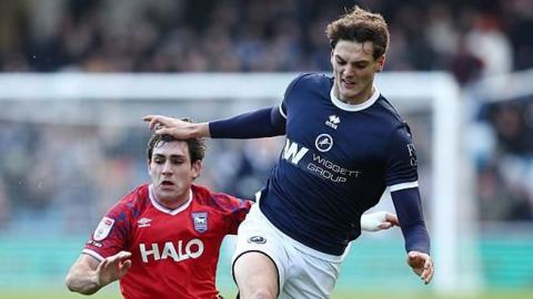 Action from Millwall v Ipswich Town involving Caleb Miller