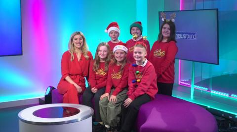 Jenny and guests in the studio