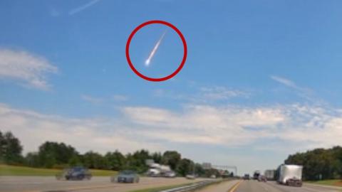 A fireball is seen in the sky.