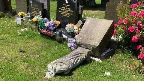 a statue has had its head knocked off