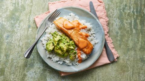 Sticky salmon with rice and smashed avo