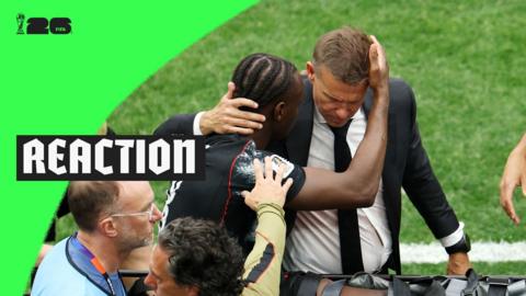 Jesse Marsch comforting Ismael Kone 