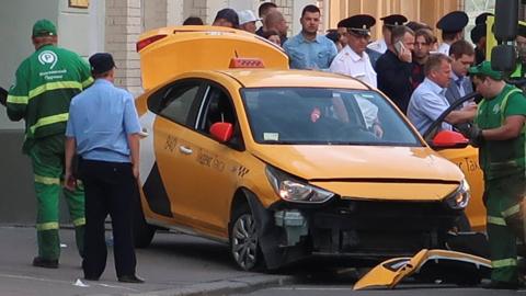 Damaged taxi in Moscow on 16 June 2018
