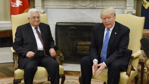 US President Donald Trump (R) meets with President of the Palestinian Authority Mahmoud Abbas in the Oval Office.