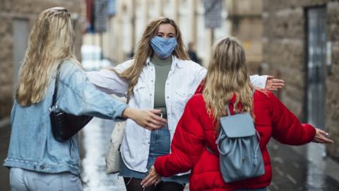 Students in face masks in Newcastle