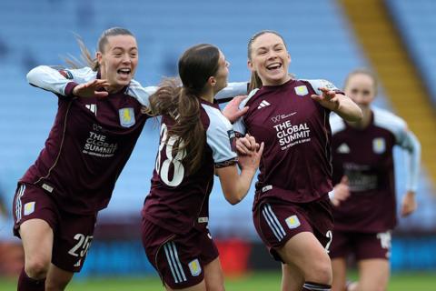 Kirsty Hanson celebrates with her team-mates