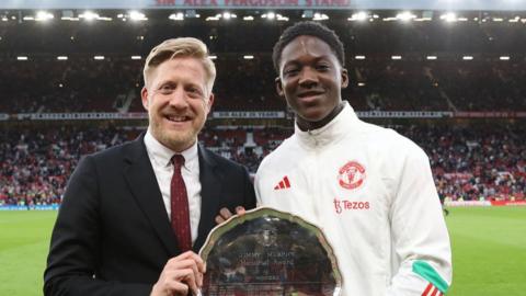 Manchester United academy director Nick Cox (left)
