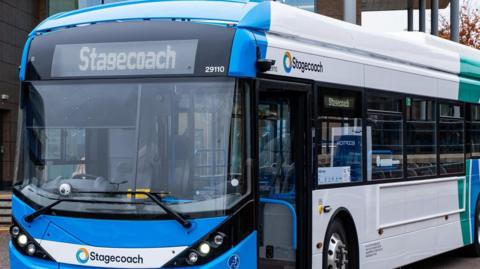 A stagecoach bus in its traditional blue and green and white colours