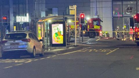 Firefighters at the scene of a reported fire in Glasgow city centre
