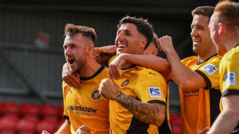 Jack Scott celebrates scoring penalty 