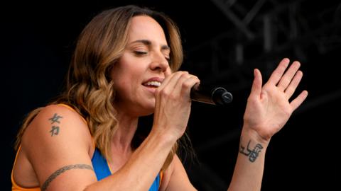 Melanie C performing live on stage during the Pub in The Park festival in 2022