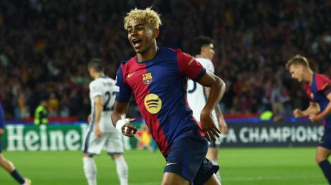 FC Barcelona's Lamine Yamal celebrates scoring their first goal