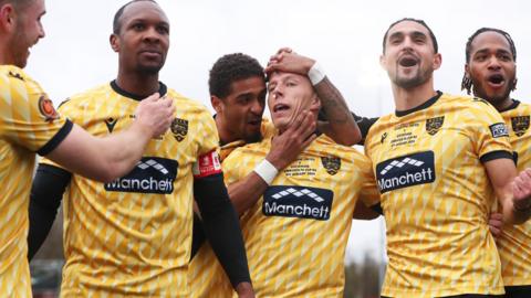 Maidstone United celebrate Sam Corne's penalty against Stevenage