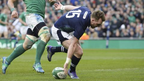 Stuart Hogg scores a try for Scotland against Ireland