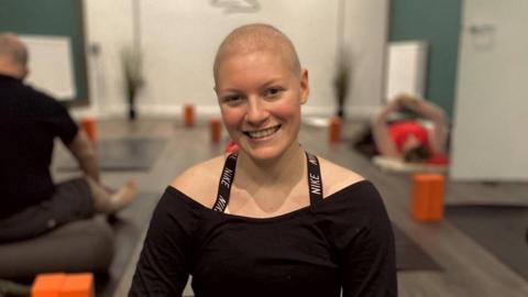 Ella Dawson doing yoga during her cancer treatment