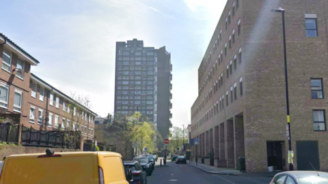 Google street view image of Dorset Street with a road surrounded by different types of housing on either side