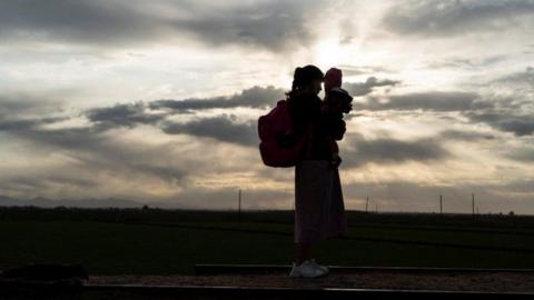 Ukrainian refugee and child