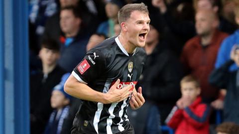 Matthew Platt celebrates scoring Notts County's second goal at Peterborough 