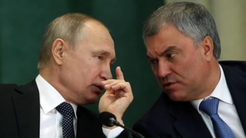 ussian President Vladimir Putin (L) talks to State Duma Speaker Vyacheslav Volodin (R) during his annual meeting with top prosecutors at the Prosecutor General's Office on March 19, 2019