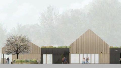 An artist's impression of the planned pavilion with two pitched roofs joined together by a black flat roof structure, with plants on the roof.