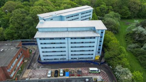 A drone view of the accommdation blocks at Arrowe Park Hospital where passengers and crew are set to leave