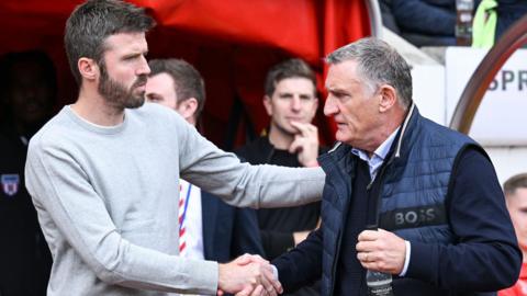 Michael Carrick and Tony Mowbray shaking hands