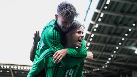 Conor BRadley and Isaac Price celebrate against Iceland