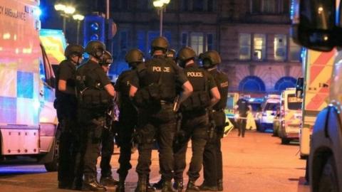 Armed Police officers at Manchester Arena