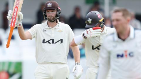 Dom Sibley celebrates scoring fifty