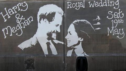 Picture of Prince Harry and Meghan Markle drawn in mud