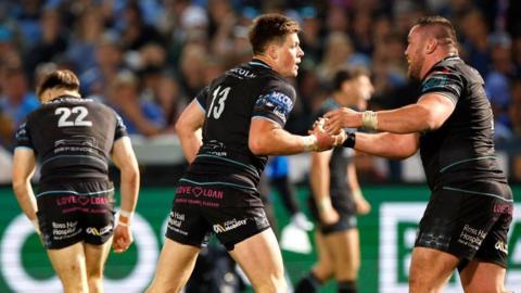 Huw Jones (centre) scored the third Glasgow try in Pretoria