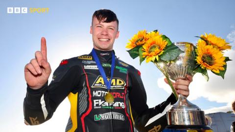 Richard Kerr celebrates winning the Sunflower Trophy