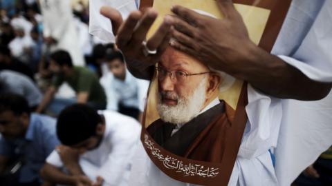 Bahrainis attend a protest against the revocation of the citizenship of Shia cleric Sheikh Isa Qassim on 20 June 2016, near his house in the village of Diraz