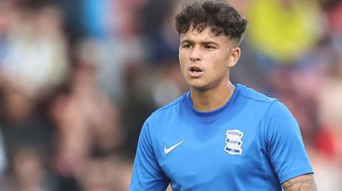 Alfie Chang warming up before a game for Birmingham City