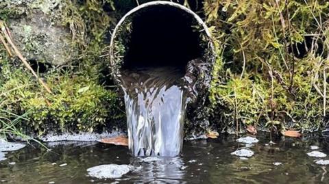 Discharge into a river