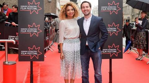 Tianna Chanel Flynn and Martin Compston attends the screening of "Tommy's Honour" and opening gala of the Edinburgh International Film Festival