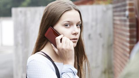 A woman using a smartphone