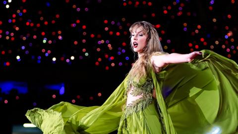Taylor Swift performs onstage at Estadio Olimpico Nilton Santos in Rio de Janeiro on 17 November