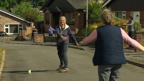 Every morning at 10 o'clock, the residents of Bryn Rhydd in Ruthin are keeping their morale up by doing a socially distanced exercise class.