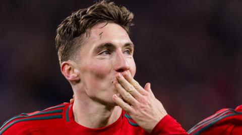 Harry Wilson celebrates scoring for Wales 