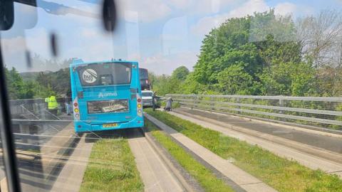 The view from inside a bus of the Luton-Dunstable busway being blocked by emergency services