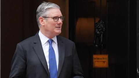 Keir Starmer standing outside No 10 Downing Street