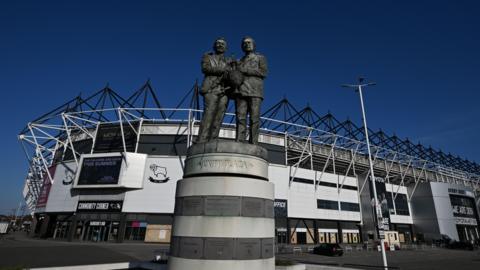 A statue of Brian Clough and Peter Taylor outside Pride Park
