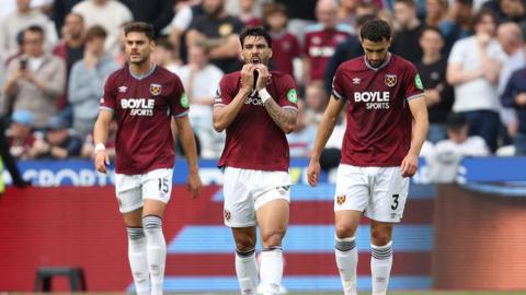 West Ham players looking dejected
