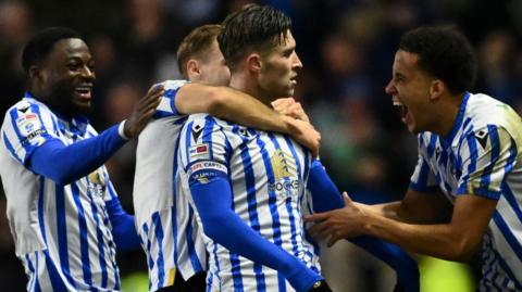 Josh Windass celebrates scoring