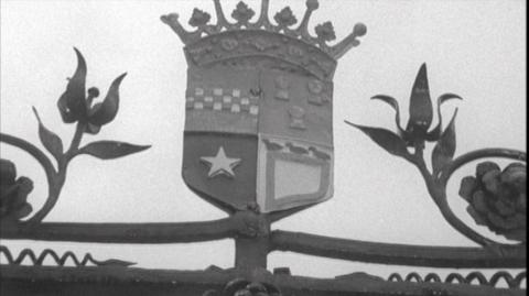 The crest of the Traquair family.