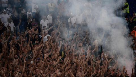 Lazio"s fans cheer during the Italian Serie A football match Lazio vs Napoli at the Olympic Stadium in Rome on 18 August 2018.